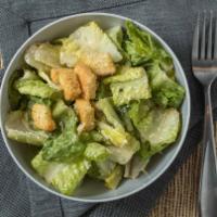 Caesar Salad · Romaine, tomato, Parmesan and croutons with Caesar dressing.