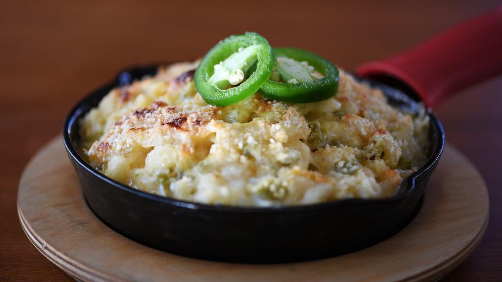 Jalapeno Popper (Medium) · This is a hot one. Cabot Cheddar, American, and Muenster cheeses mixed with diced jalapeno peppers baked in a rich Bechamel sauce with a breadcrumb crust.