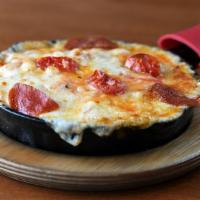 Pizzaroni (Medium) · Sliced pepperoni, tomatoes, garlic, and seasonings mixed with Marinara sauce, fresh Mozzarel...