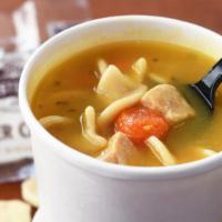 Chicken Noodle  · A classic family recipe. All white chicken breast with carrots n’ celery, lightly seasoned i...