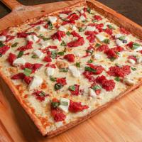 Margherita Pizza · Italian tomatoes, basil leaf, olive oil, fresh mozzarella.