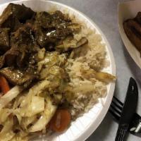 Sample Platter · Curry goat jerk chicken oxtail rice and beans plantains cabbage