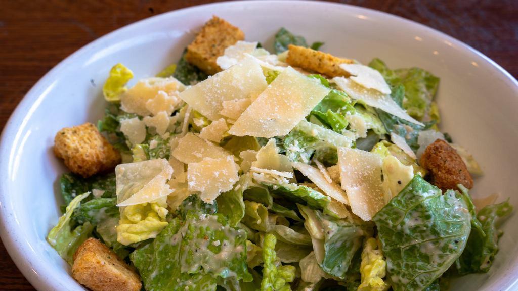 Caesar Salad · Romaine with Caesar dressing, croutons and Parmesan.