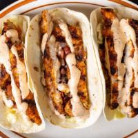 Cajun Chicken Tacos · Cajun chicken, lettuce, pico de gallo, chipotle ranch.