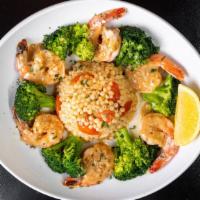 Shrimp Couscous · Shrimp garlic white wine sauce, lemon tomato couscous, broccoli.