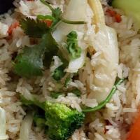 Chili Basil Fried Rice · Stir-fried rice with onions, tomatoes, bell peppers and fresh basil in chili garlic spicy sa...