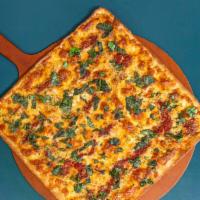 Grandma Pizza · Thin crust Sicilian, sauce, basil, mozzarella and parmesan cheese.