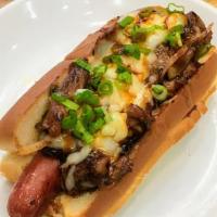 K-9 Dog · Beef hot dog, bulgogi beef, onions, cheese, and scallion.