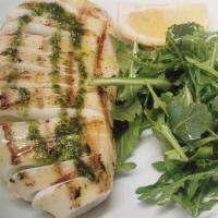 Grilled Calamari · Salad greens, grilled calamari, EVOO, and lemon.