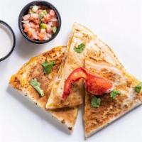Lobster Quesadilla · 2.5oz of Maine Lobster, Corn, Red Onion, Cilantro, and a Mexican Cheese Blend (Monterey Jack...