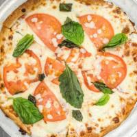 Grandma Pizza · Fresh mozzarella, tomato sauce, and fresh basil.