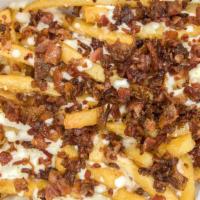 Cheese Bacon Fries · Fried potatoes topped with cheese and bacon.