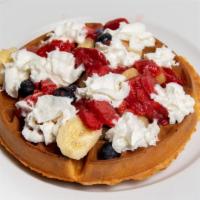 Tutti Frutti Waffle · Belgium Waffle topped with strawberries, blueberries, bananas and whipped cream.