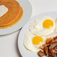 Hungry Man Special · Three eggs any style with two bacon, two sausage, two pancakes or French toast and coffee.
