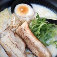 Kagosima Ramen · Added with rich creamy pork broth, roasted pork, egg, scallions, and bean sprouts.