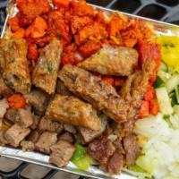 Triple Trouble · Chicken, kabob and lamb with rice. Regular salad included