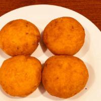Aloo Tikki · Potatoes patties deep-fried in chick pea batter.