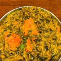 Chicken Tikka Saag · All white chicken tikka pieces cooked in spinach with herbs and spices.