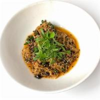 Szechuan Chili Wontons · Shrimp and pork dumpling, Szechuan chili oil, fermented black beans