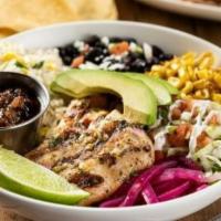 Grilled Chicken Border Bowl · Grilled chicken brushed with lime-cilantro chimichurri, cilantro lime rice, black beans, pic...