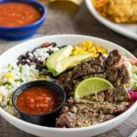 Grilled Steak Border Bowl · Grilled steak brushed with lime-cilantro chimichurri, cilantro lime rice, black beans, pickl...