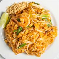 Pad Thai (Chicken) · Rice noodle wok fried with egg, crushed peanut, scallion, bean sprout and tamarind juice.
