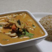 Red Curry · Hot and spicy. Your choice is sautéed in rich and spicy red curry with string beans, bamboo,...