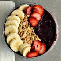 Acai Bowl · Classic Brazilian style frozen acai bowl topped with fresh strawberry, banana, and granola.