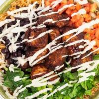 Blackened Chicken Caesar Burrito Or Bowl · Mexican rice, black beans, blackened chicken, caesar dressing, Jack cheese, romaine, pico de...