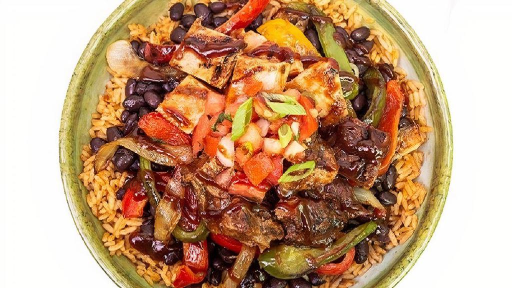 Mixed Grill Bowl · Grilled mesquite chicken and steak served over rice and black beans with fajita veggies, BBQ sauce, green onions and salsa.