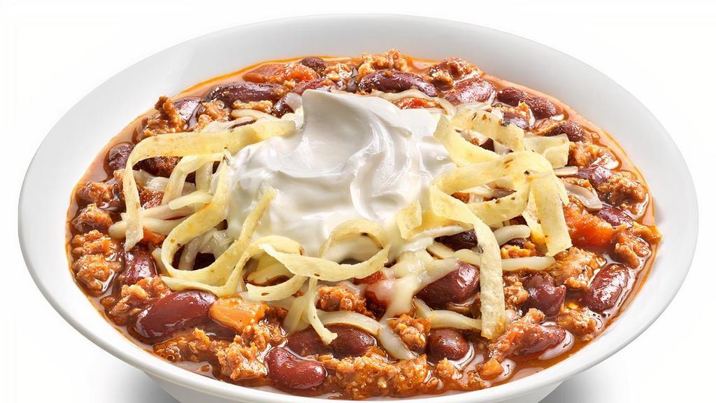 Turkey Chili · Ground turkey, onions, garlic, tomatoes, green chilies, beans, and spices. Topped with Jack cheese, crispy tortilla strips and sour cream