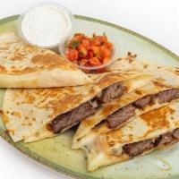 Classic Quesadilla · Jack cheese and your choice of chicken, steak (+1.00), pork carnitas, taco beef, fish or far...