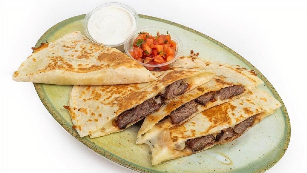 Classic Quesadilla · Jack cheese and your choice of chicken, steak (+1.00), pork carnitas, taco beef, fish or farm-fresh veggies and beans. Served with sour cream and salsa
