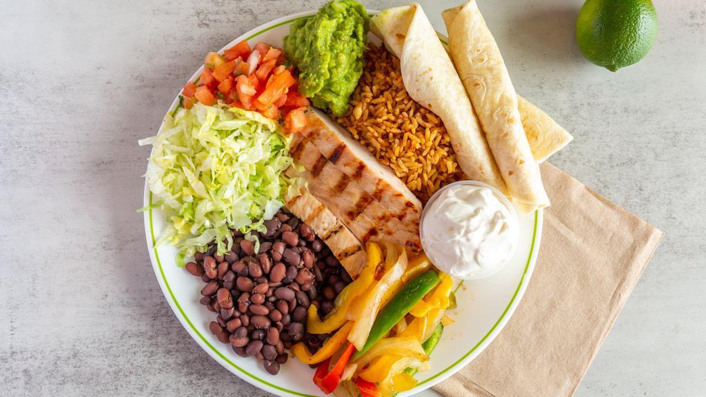 Grilled Chicken Fajita Platter · Three soft flour tortillas served with Grilled chicken, fajita veggies, rice and beans, guac and salsa.
