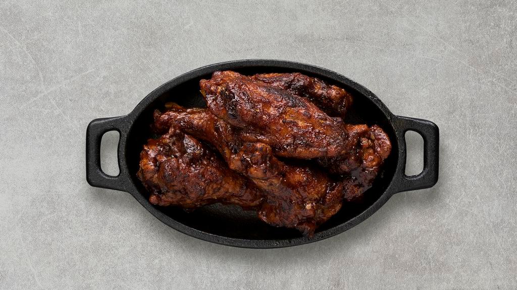 Jerk Wings · Served with celery or carrots, and blue cheese or ranch.