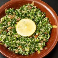 Tabouli Salad · Tomatoes finely chopped parsley mint bulgur and onion and seasoned with olive oil lemon juic...