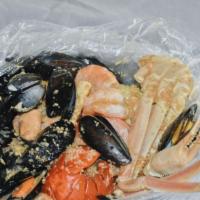Combo D · 1/2 lb shrimp head off, 1/2 lb black mussels, 1 piece lobster tail, and 1/2 lb snow crab.