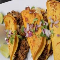 Birria Tacos · 3 Beef and cheese tacos with the sauce on the side