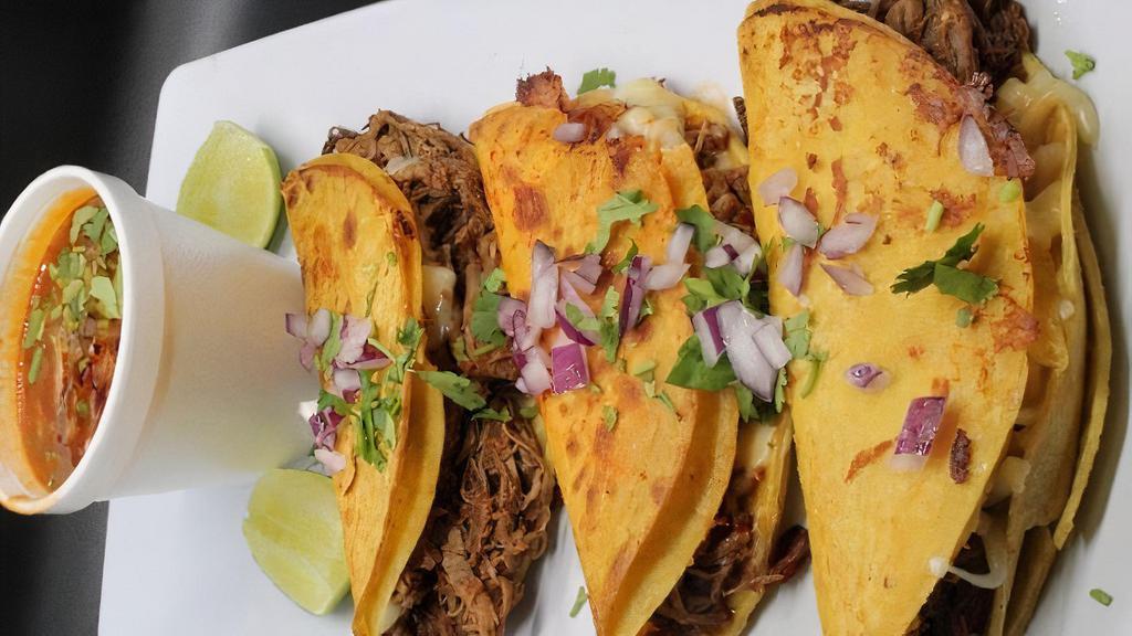 Birria Tacos · 3 Beef and cheese tacos with the sauce on the side