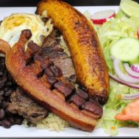 Tipico Montañero · Fried pork, fried plantain, egg. Served with salad, rice, and beans.

Consuming raw or under...