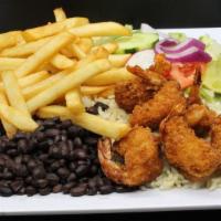 Camarones Empanizados · Breaded shrimp with French Fries. Served with salad, rice, and beans.