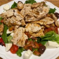 Tiffany Salad · Romaine lettuce, bruschetta, grilled chicken, fresh mozzarella, roasted red peppers, and oli...