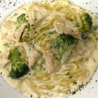 Fettuccine Alfredo · Sweet butter, cream and parmigiana cheese