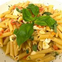 Penne Alla Caprese · With fresh mozzarella, chopped tomatoes, basil, and garlic.
