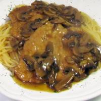 Chicken Marsala · Sautéed  chicken with mushrooms and herbs, in a marsala demi-glace, served over pasta.