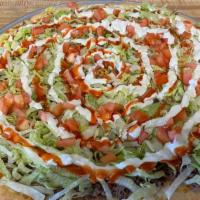 Taco Pizza · Steak, red onions, lettuce, tomatoes blue cheese and hot sauce