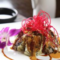 Mini Volcano Roll · White tuna and crabmeat lightly fried, glazed in spicy mayo and eel sauce.