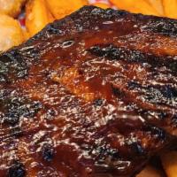 Bbq Pork Ribs · slow smoked for 6 hours until tender and succulent