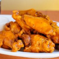 Wings · In our homemade mesquite flavored buffalo sauce and served with avocado ranch sauce for dipp...