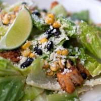 Spicy Caesar Salad · Romaine, Parmesan cheese, garlic croutons and Caesar dressing. Spicy.